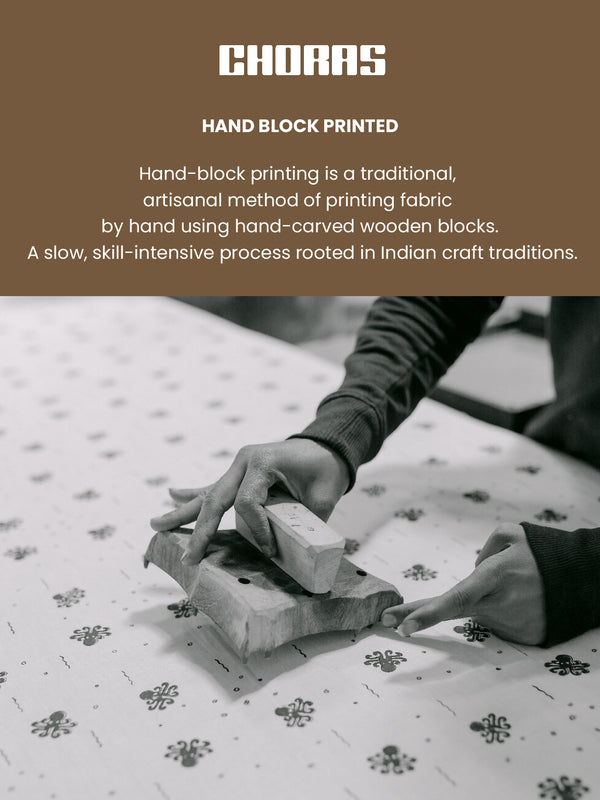 Hand block printing process with text about traditional printing method