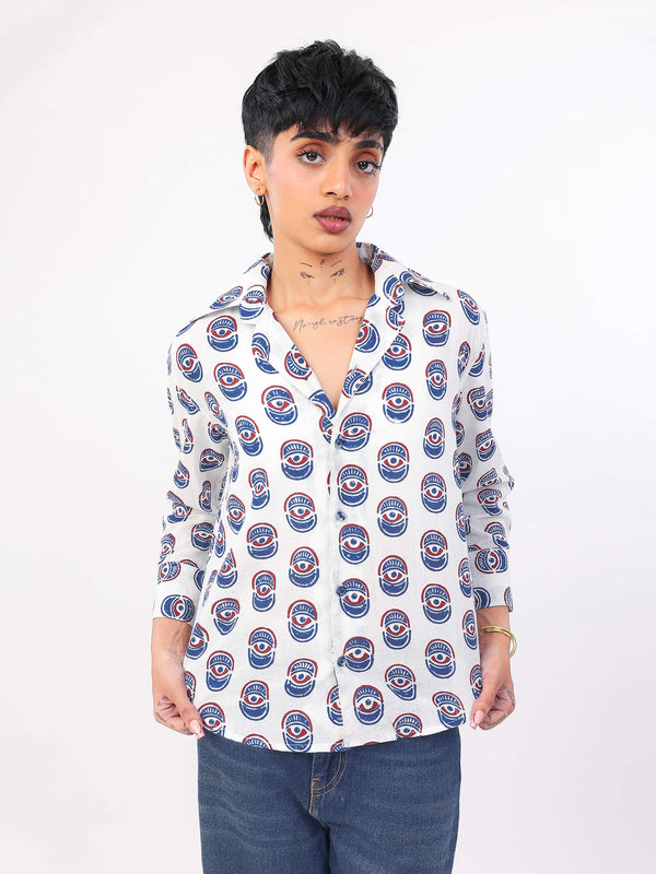 Women wearing a evil eye pattern shirt with a white background